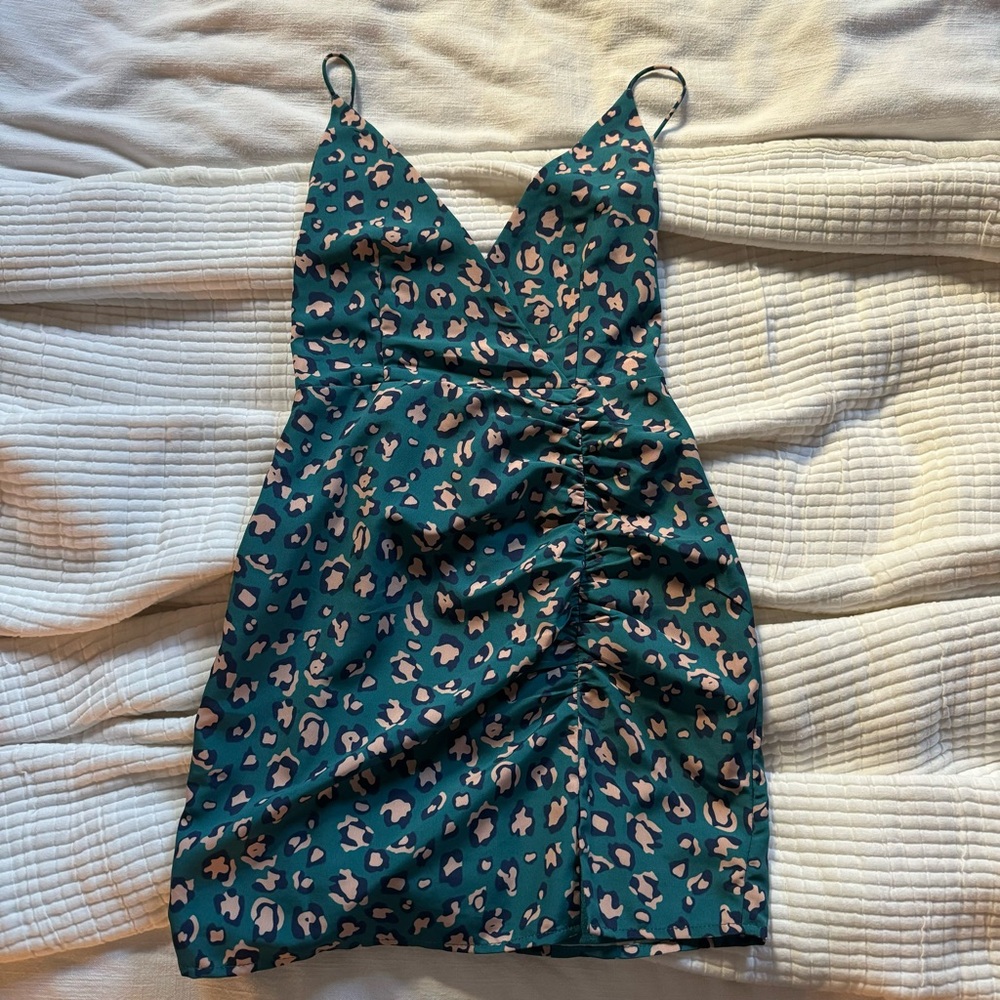 Superdown cheetah mini dress side rusching. New without tags. Never worn.